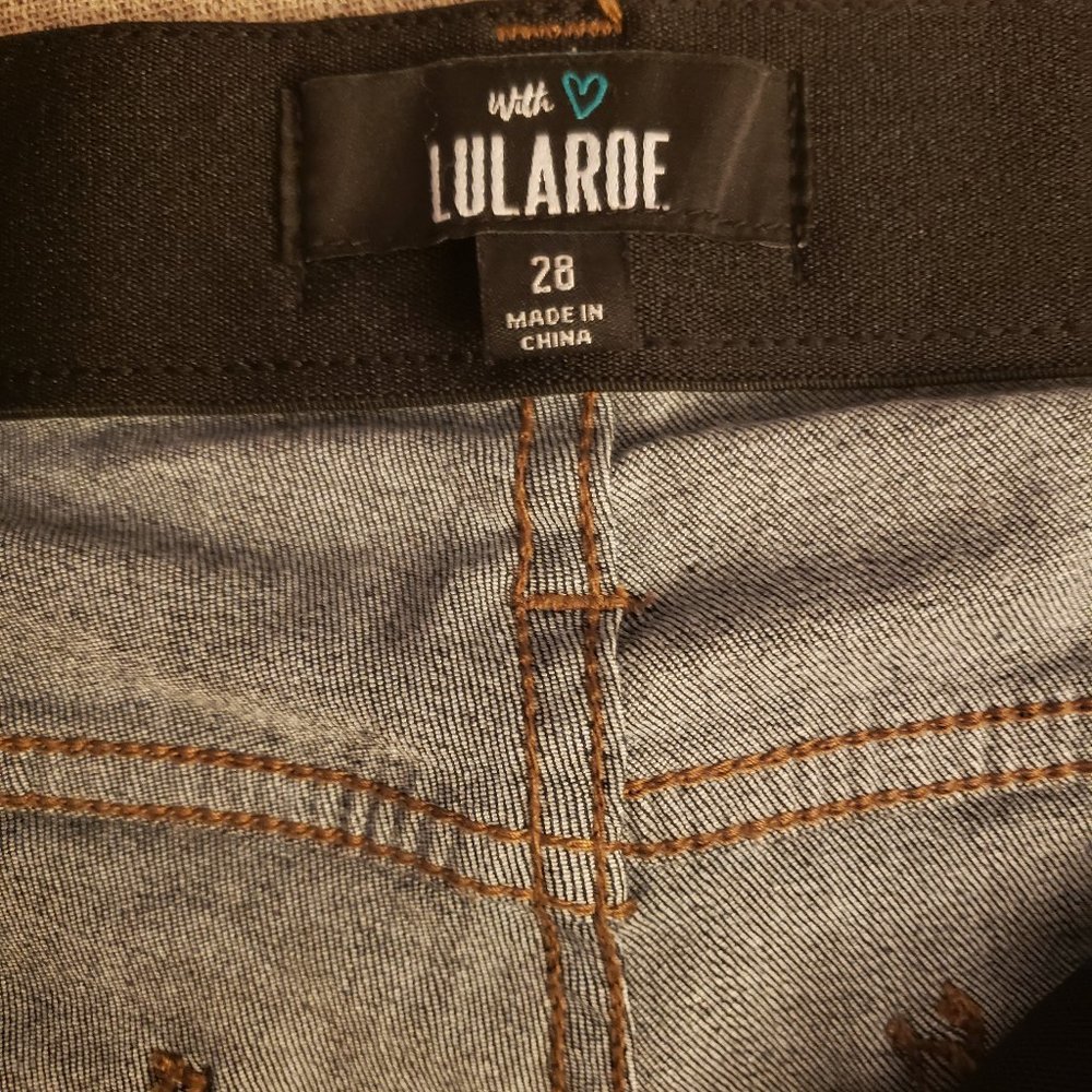 Lularoe size 28 dark wash distressed denim